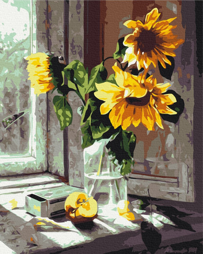 Bouquet of sunflowers in the window